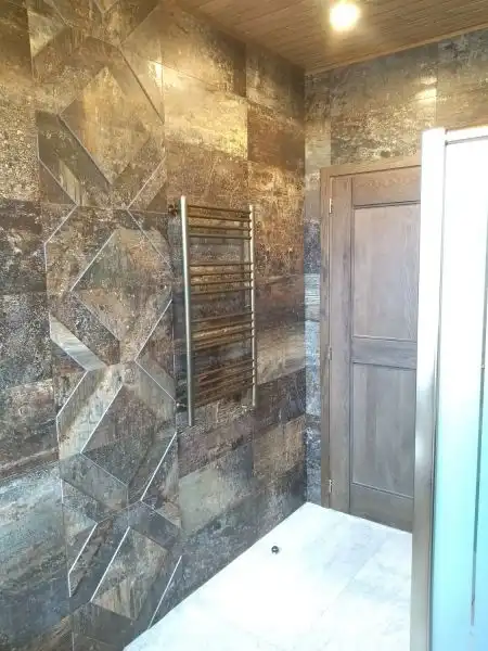 Установка рушникосушарки на керамограніт